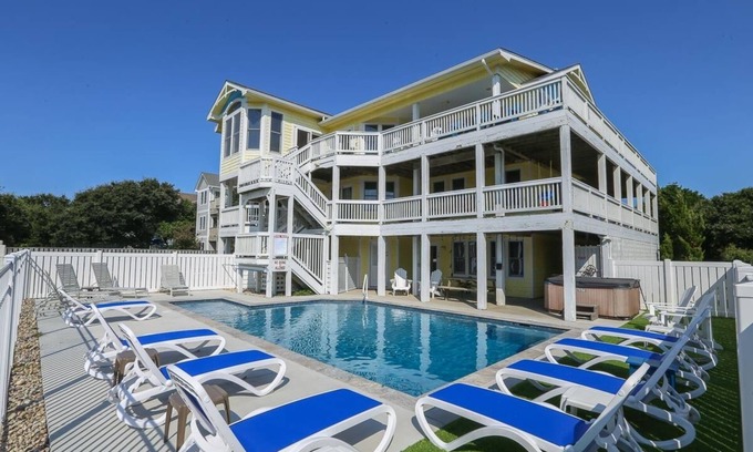 Duck House | Magnificent oceanside home with pool, game room, elevator, steps to beach