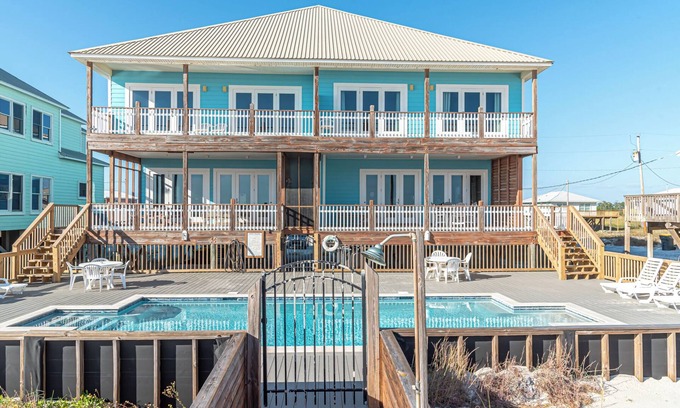 Southpointe House | Margarittaville East. Professionally decorated, Gulf front 6 BR 4.5 BA unit with a pool