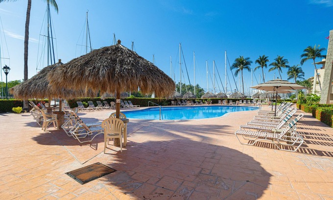 Bajio Apartment | Marina Residences 2 bed + 2 bath pool & canal view