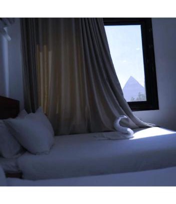 Giza Hotel | mass sphinx & pyramid stay