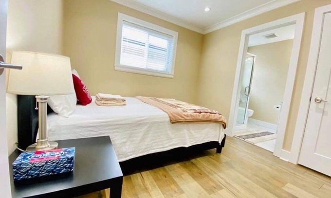 Queensborough House | Master bedroom with private bathroom in New home
