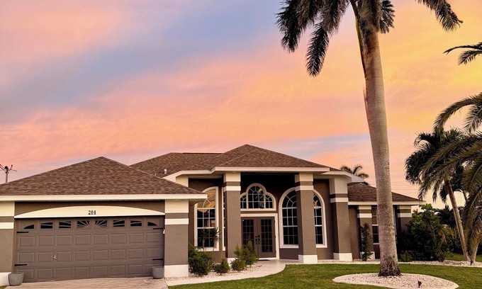 Pelican House | McShandy's 4B2B modern home with heated pool and gulf access