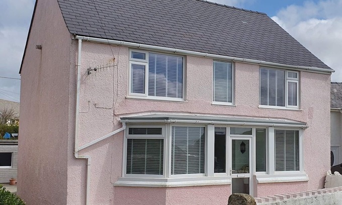 Holyhead House | Min y don is a detached house with spectacular sea views, near treaddurbay beach