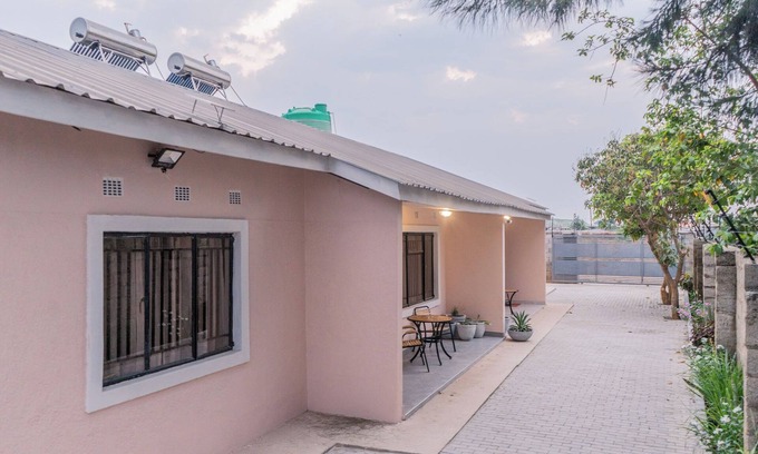 Lusaka Apartment | Modern 2-BR Serviced Apartment in Lusaka - Near Airport, Garden & Wi-Fi