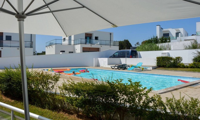 Salir do Porto Apartment | Modern, air-conditioned family apartment with pool. 10 minute walk to beach
