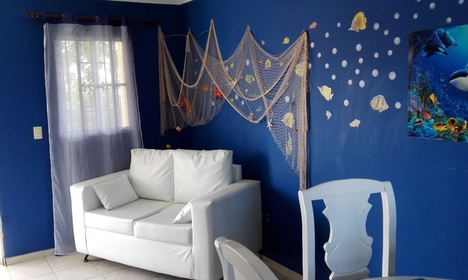 Ensanche Isabelita Apartment | Modern and colorful condo