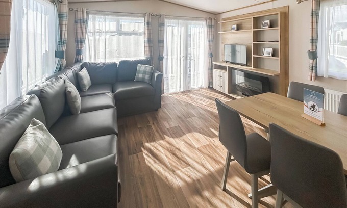 Bleadon House | Modern and contemporary 12ft-wide caravan with one double and two twin.