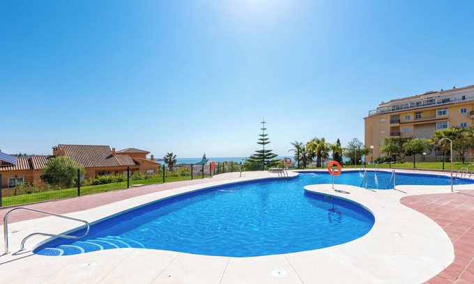 La Cala de Mijas Apartment | Modern Apartment 'In Jardin Botanico' with Sea View, Pool, Wi-Fi, Garden & Terrace