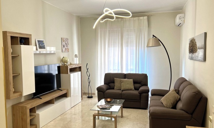 Palermo Apartment | Modern apartment in the center with private parking space and communal garden
