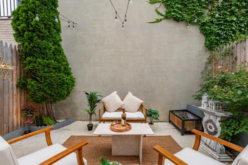 The Heights House | Modern Condo with Private Porch, Mins to NYC