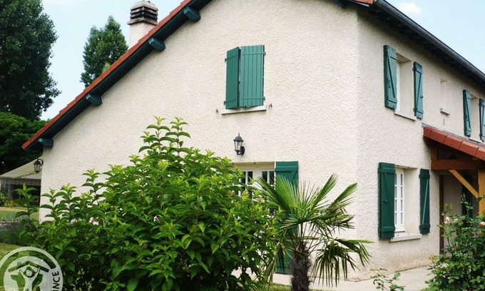 Renaison Cottage | Modern house with large garden and fireplace in Renaison