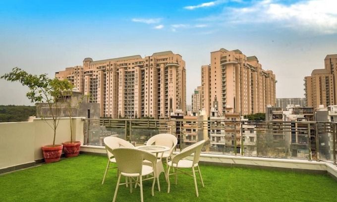 Gurugram Apartment | Modern loft overlooking hills and park