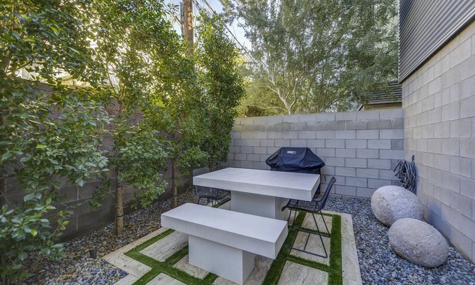 Camelback East House | Modern luxury loft with Floor to Ceiling windows. West Elm/CB2