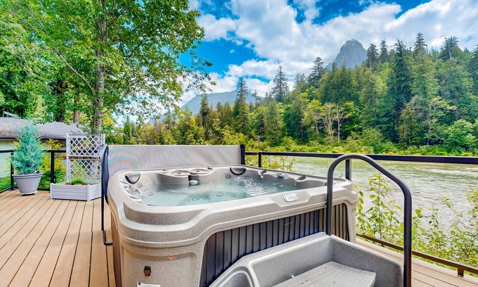 Gold Bar House | Modern riverfront home with hot tub, gas grill and patio