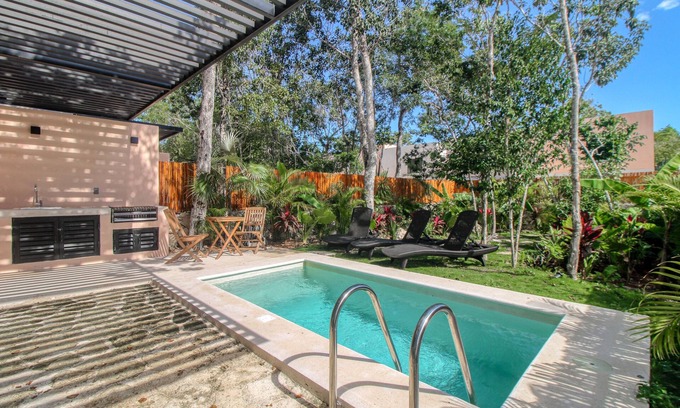 Tulum House | Modern villa with private plunge pool, resort pool, patio, cinema & playground