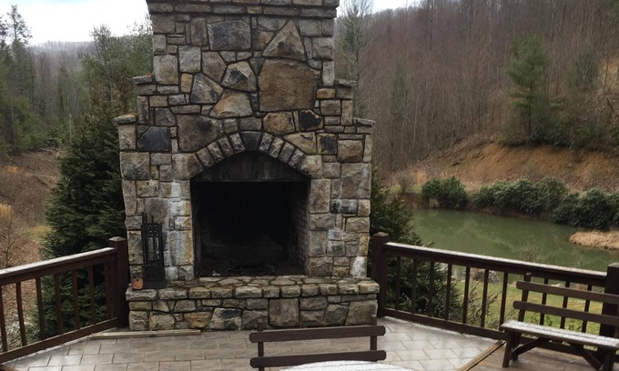 Butler House | Mountain cabin large deck overlooking stream.