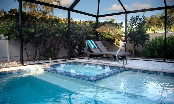 Central Naples House | Naples Outdoor Paradise/HEATED Pool/Hot Tub/Only 1.2mi from Beaches!