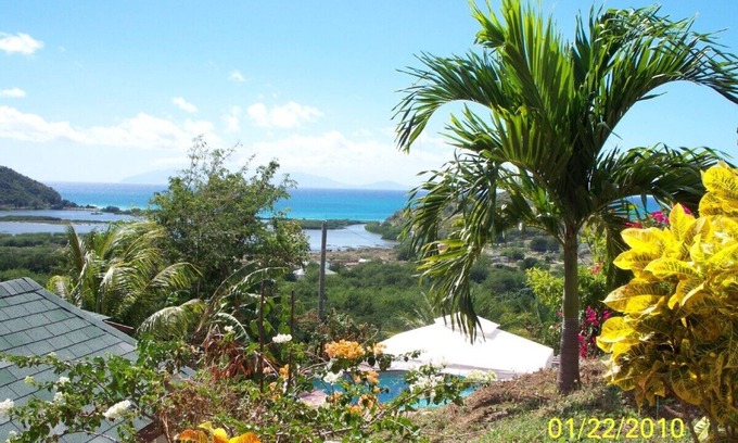 Valley Church Cottage | Nestled in the hills overlooking the Caribbean seas.