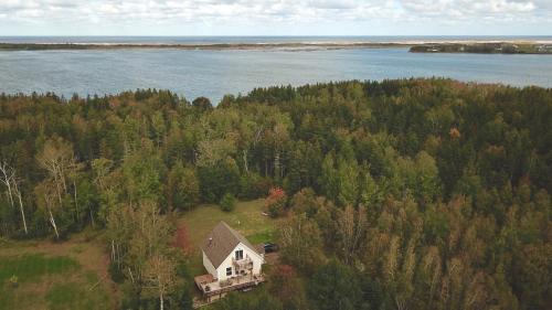 Brackley Beach House | Nestled Woods by Brackley Beach