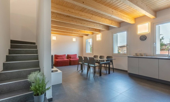 Ferrara Apartment | New and spacious apartment of about 145 sqm, capable of accommodating up to 11 people, located on the second floor of a modern building without a lift.The property is located in a residential area of ​Ferrara, a few minutes walk from the city center