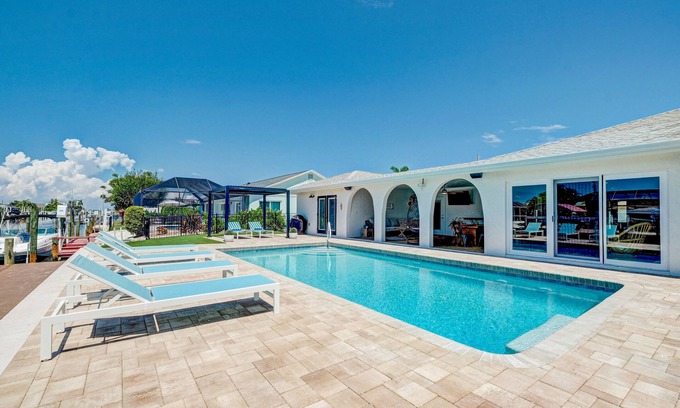 Whitney Beach House | ⚓New! Cortez Cabana! Canal front home w/heated pool & boat dock!⚓
