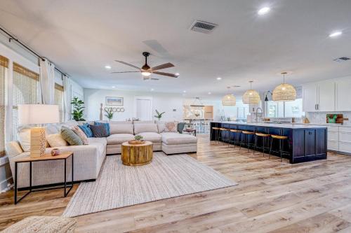 Whitney Beach House | NEW! Cortez Cabana! Canal front home with heated pool & boat dock!