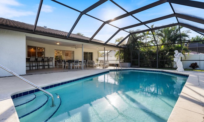 Palm River Estates House | New Listing Discount! Tropical Bliss - Heated Pool, 5 miles to Vanderbilt Beach!