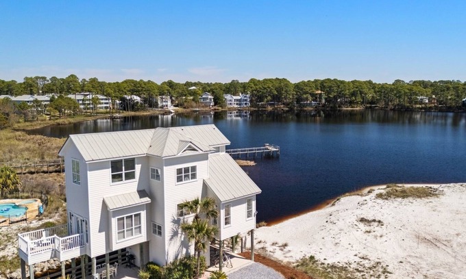 Dune Allen Beach Apartment | New Listing! Gulf and Lake Views! Private Dock! Beach Access Just Across the Street! Bikes!