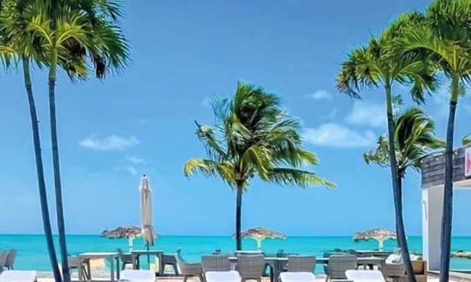 Palm Cay Condo | New Luxury 3 bedroom villa steps from the beach.