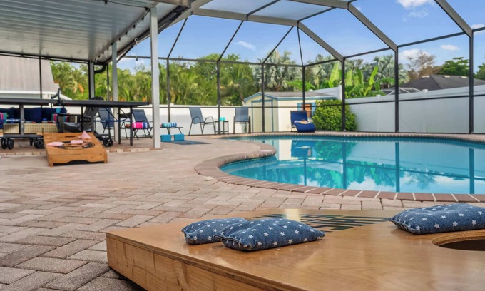 Palma Sola House | NEW! Sunshine Getaway! Heated Pool, Hot Tub, Games