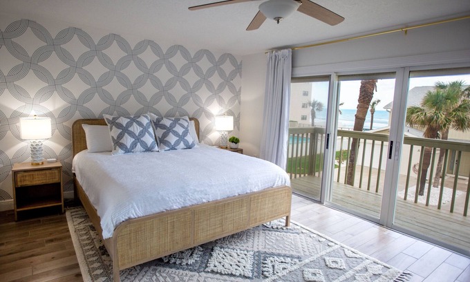 New Smyrna Beach House | Newly renovated townhouse steps from the beach and pool