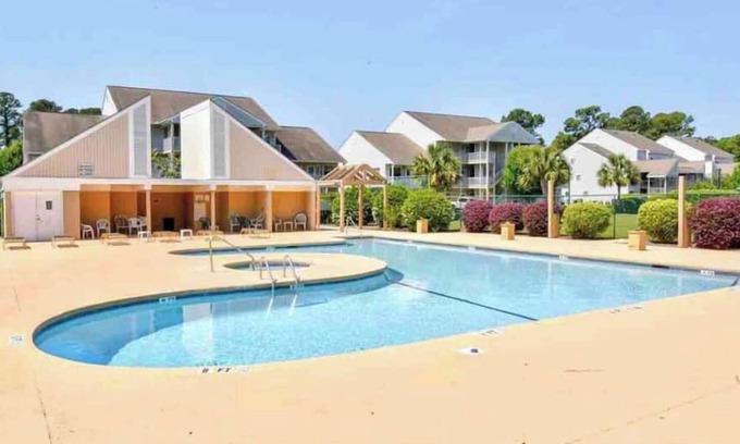 Little River Condo | Newly renovated golf condo in quiet community with pool!