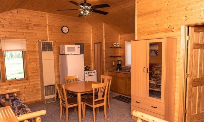 Houghton Lake Cabin | Newly updated knotty pine cabin, within walking distance from Houghton Lake.