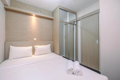 Jatinegara Apartment | Nice and Fresh 2BR at Bassura City Apartment By Travelio