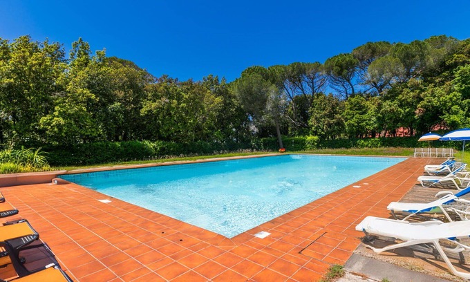 Rosignano Marittimo Apartment | Nice apartment for 7 guests with pool, WIFI, TV and patio