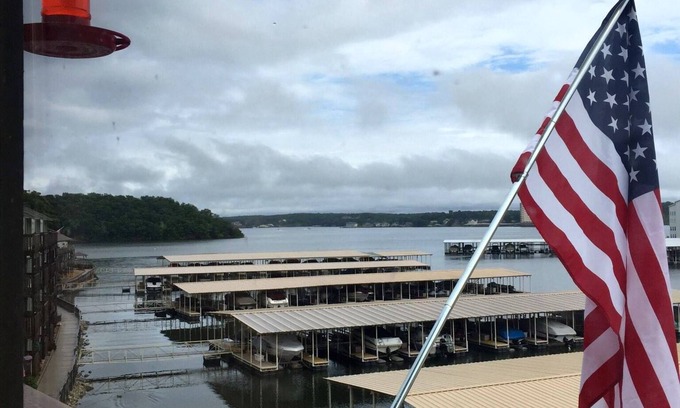 Village of Four Seasons Condo | NO EXTRA FEES. LakeFront with view of channel. Slip Included.