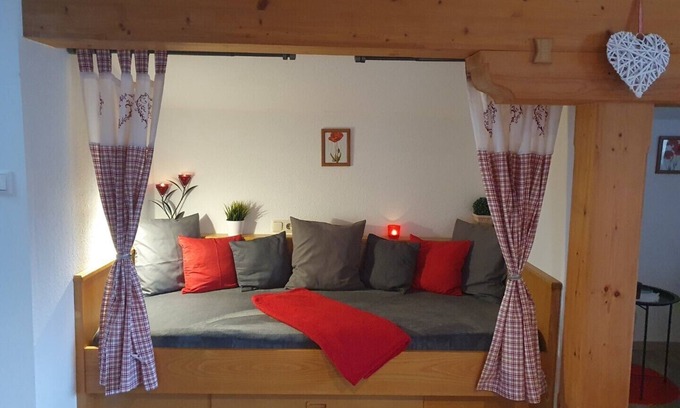 Oberschonau Apartment | Non-smoking vacation apartment, 65 m², separate bedroom, living room with open kitchen, 2 WCs, balcony
