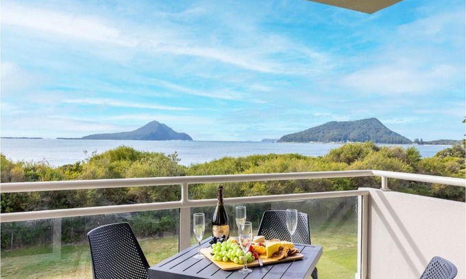 Nelson Bay Apartment | Ocean Shores, 7 27 Weatherly Cl - waterfront with fabulous views and WiFi
