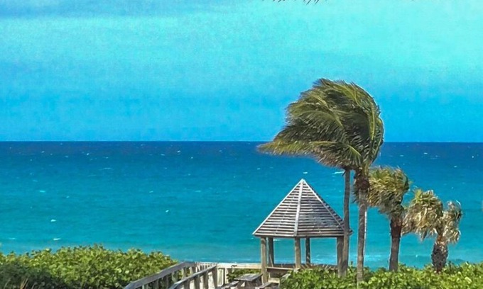 Juno Beach Condo | Oceanfront Condo 2Bed2Ba Heated Pool & Hot Tub Walk out to sand, sea, sunshine.