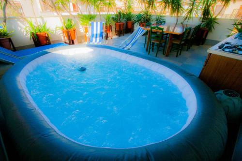 Ladispoli Apartment | Old Style by the sea, roof terrace with pool and kitchen, Ladispoli