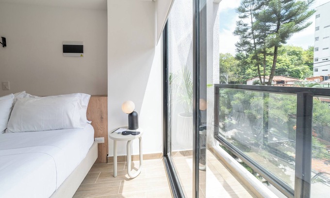 La America Apartment | Oliving in Laureles by Wynwood House