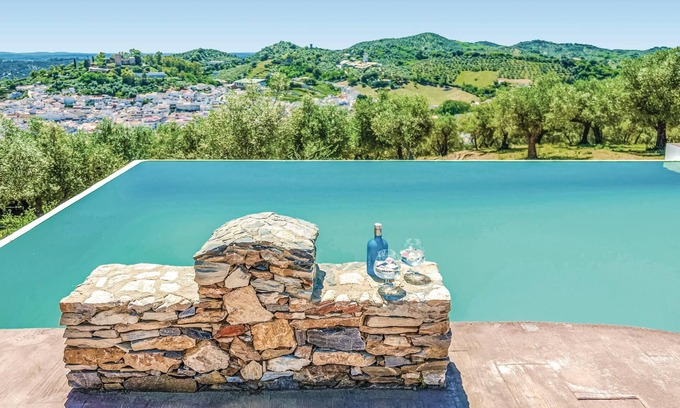 Constantina House | On a small hill in the mountains of Constantina, you will find this lovely vacation finca with a spe