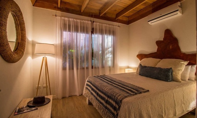 Playa Guiones House | Only steps to the surf and a short walk to yoga, this modern casita sleeps 6.
