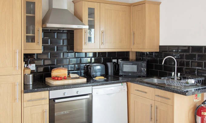 Clynnogfawr Cottage | Open plan, spacious ground floor cottage with stunning sea views.