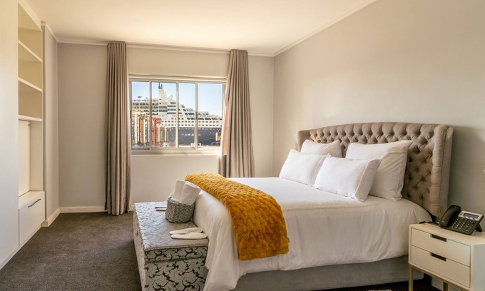 Victoria and Alfred Waterfront Apartment | Opening into a balcony with garden views, the air-conditioned 2bedroom apartment