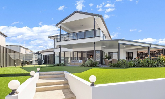 Banksia Beach House | Opulent Canal-Front Retreat
