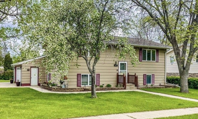 Aberdeen House | OurCozyOasis, Relax in the warmth of the fireplace in this homey upstairs.