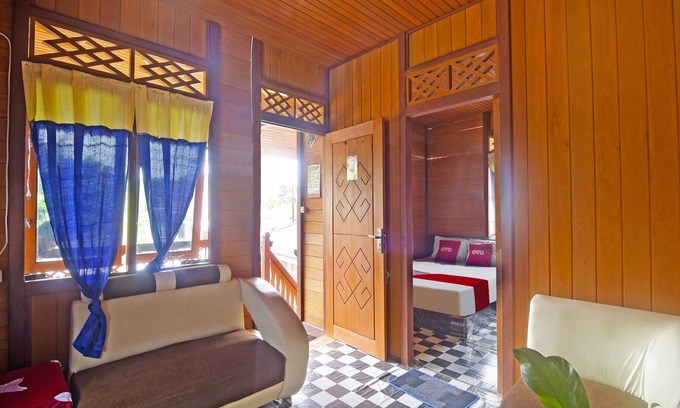 Manado City Centre Hotel | OYO 91246 Pulisan Ekowisata Homestay Near Wisata Pantai Desa Pulisan (Pulisan Beach Tour)