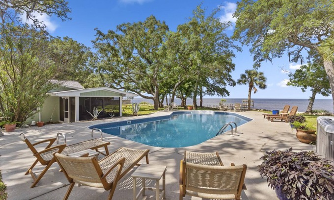 Magnolia Bluffs House | "PARADISE ON THE BAY!" Private Pool, Dock & Hot Tub! Just 10 min to SGI