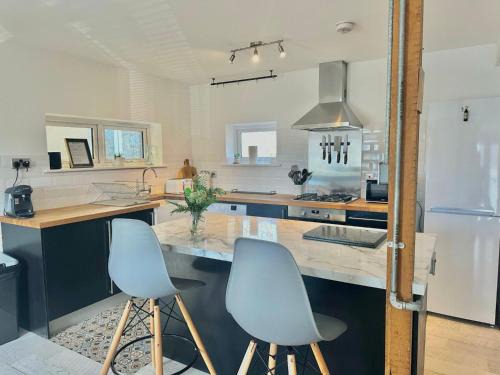 Kidwelly House | Pass the Keys Family home walking distance to beach Pet friendly